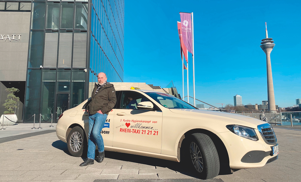 Georg Robens and his taxi