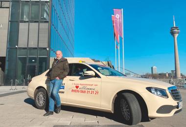 Georg Robens and his taxi