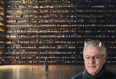 Robert Joseph - with horns, and a small person in front of a wall of wine. (Image: Cath Lowe and Midjourney AI)