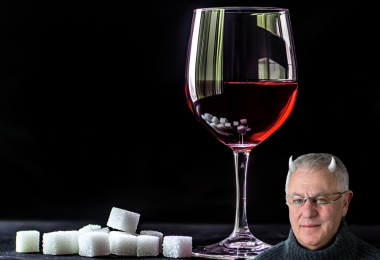Glass of wine with sugar cubes and Robert Joseph with horns. (Image: Cath Lowe and Midjourney AI)